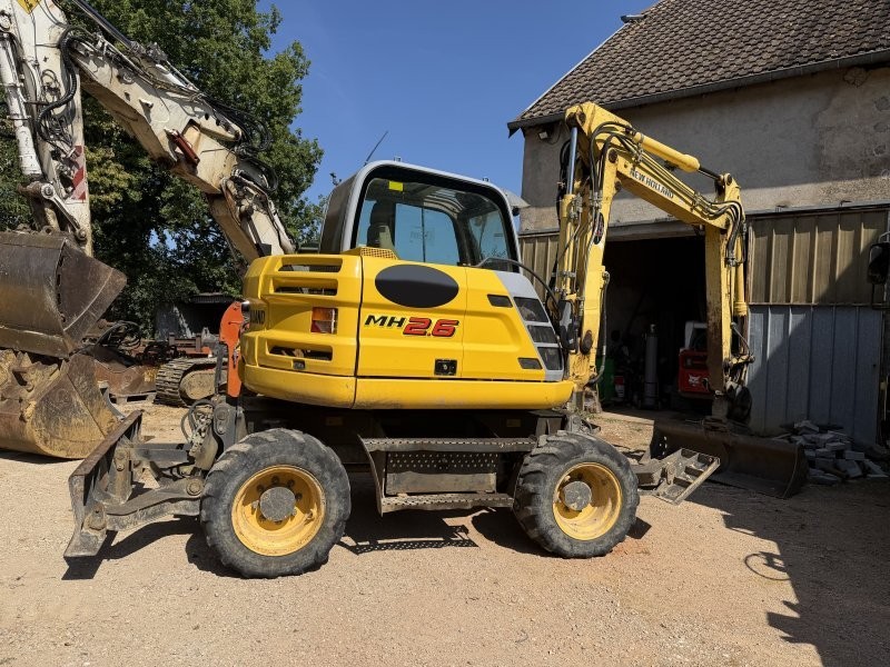 Pelle à pneus NEW HOLLAND type MH 2.6